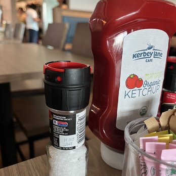 Kerbey Lane Cafe - a ketchup container and a container of ketchup - Breakfast & Brunch Near Me - San Antonio, Texas
