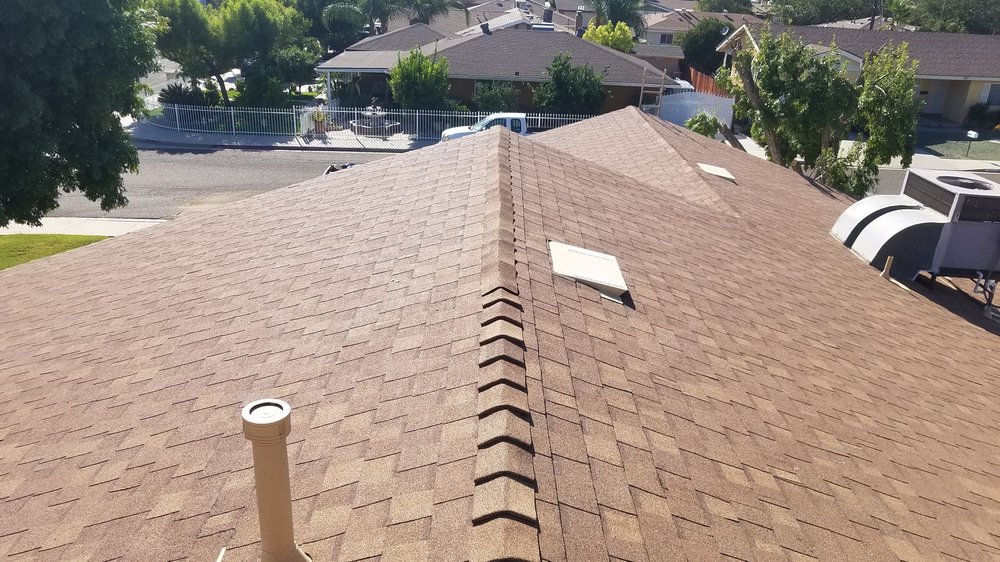 Slide of Woolbrights Roofing and Construction