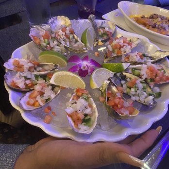 Perla Azul - Oyster absolutely covered in Pico de Gallo. The amount of fresh onion was overbearing. Barely could taste the oysters, which were pricey. - Seafood Near Me - La Habra, California Perla Azul - Oyster absolutely covered in Pico de Gallo. The amount of fresh onion was overbearing. Barely could taste the oysters, which were pricey. - Seafood Near Me - La Habra, California