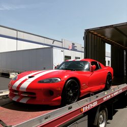 Specialty Towing  - 97 Supercharged Viper getting off loaded from a semi truck