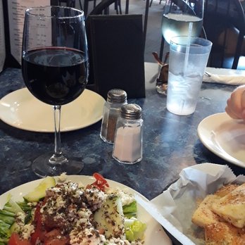 Calvino's - Cucumber Salad (side), house Cab and complimentary garlic bread - Italian Near Me - Toledo, Ohio