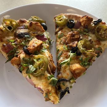 Pizza Twist - Medium Curry Chicken Pizza. Added jalapeños to my half. It was pretty good. - Pizza Near Me - Round Rock, Texas Pizza Twist - Medium Curry Chicken Pizza. Added jalapeños to my half. It was pretty good. - Pizza Near Me - Round Rock, Texas