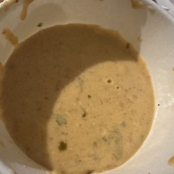 Cafe Rio Fresh Modern Mexican - A quarter filled cup of queso. Paid full price for this. More chips than there was queso - Mexican Near Me - Valencia, California