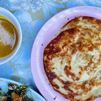 Oma's Hideaway - Cheesy Roti Canai - Asian Fusion Near Me - Portland, Oregon Oma's Hideaway - Cheesy Roti Canai - Asian Fusion Near Me - Portland, Oregon