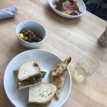 Free Reign - Roasted Carrot hummus, local arugula, pickled onions on sourdough bread with a side of roasted garlic bread! (Vegan) - Chicken Wings Near Me - Charleston, South Carolina Free Reign - Roasted Carrot hummus, local arugula, pickled onions on sourdough bread with a side of roasted garlic bread! (Vegan) - Chicken Wings Near Me - Charleston, South Carolina