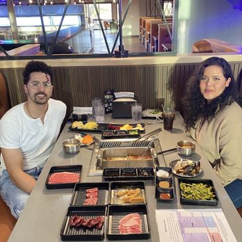 Kingpot Korean BBQ & Hotpot - Wonderful employee took this photo of my boyfriend and I! - Korean Near Me - Greeley, Colorado