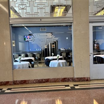 Messina's Runway Cafe - a view of the restaurant through the windows - Breakfast & Brunch Near Me - New Orleans, Louisiana