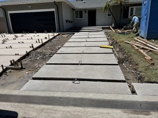 Replace cracked and uneven sidewalks with smooth, durable concrete - Remove existing surface and install a new reinforced concrete driveway designed for durability, curb appeal, and long-term performance. Replace cracked and uneven sidewalks with smooth, durable concrete - Remove existing surface and install a new reinforced concrete driveway designed for durability, curb appeal, and long-term performance.