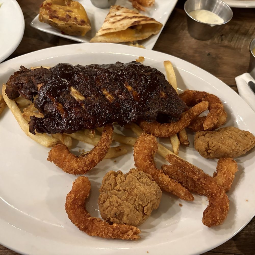 Ruby Tuesday - This is supposed to be ribs, shrimp and chicken tenders. That round thing in between the "shrimp" are supposedly chicken tenders. - American Near Me - Elizabeth, New Jersey Ruby Tuesday - This is supposed to be ribs, shrimp and chicken tenders. That round thing in between the "shrimp" are supposedly chicken tenders. - American Near Me - Elizabeth, New Jersey