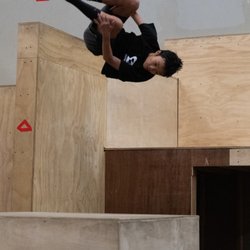Sessions Academy of Movement - A student doing a sideflip