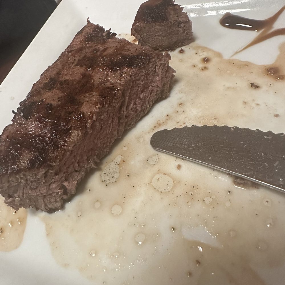 A well done steak that was supposed to be medium rare. A well done steak that was supposed to be medium rare.