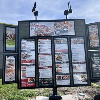 Fazoli's - a menu board in front of a restaurant - Italian Near Me - Orlando, Florida Fazoli's - a menu board in front of a restaurant - Italian Near Me - Orlando, Florida