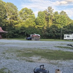 Scenic Drive RV Park and Campground - View across the gravel RV sites to the office building at Scenic Drive RV Park in Anniston, AL