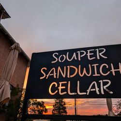 Exterior sign near main entrance from 9th St.