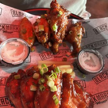 Black Market Miami - Bbq and THAI CHILL 12 Black Market Wings - Sports Bars Near Me - Miami, Florida Black Market Miami - Bbq and THAI CHILL 12 Black Market Wings - Sports Bars Near Me - Miami, Florida
