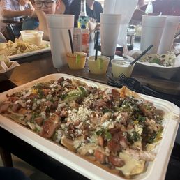 Full order of chicken nachos with margarita flight!  Perfection!