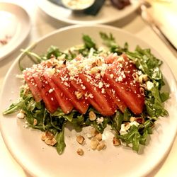 Kennedy's Steakhouse - Watermelon Salad basil, hazelnuts, chevre, arugula, citrus dressing