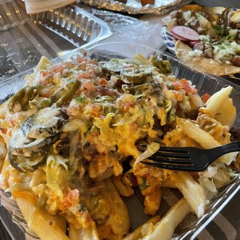 Tacos Buenrostro - Carne asada fries. Good portion, but meh flavor!! - Food Trucks Near Me - San Jose, California Tacos Buenrostro - Carne asada fries. Good portion, but meh flavor!! - Food Trucks Near Me - San Jose, California