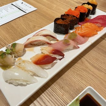 X-Fish Izakaya - Assorted sushi: squid, surf clam, salmon, tuna, yellowtail, scallop, masago, cod roe - Sushi Bars Near Me - Brea, California X-Fish Izakaya - Assorted sushi: squid, surf clam, salmon, tuna, yellowtail, scallop, masago, cod roe - Sushi Bars Near Me - Brea, California