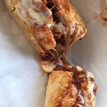 Stasio's - The Package, Meatballs, spicy sausage, and marinara with melted cheese! - Italian Near Me - Orlando, Florida Stasio's - The Package, Meatballs, spicy sausage, and marinara with melted cheese! - Italian Near Me - Orlando, Florida
