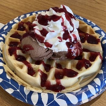 Annie's Custard and Cafe - Hot Waffle with Nutella flavored custard, whipped cream and raspberry sauce. Delicious! - Ice Cream & Frozen Yogurt Near Me - Nauvoo, Illinois