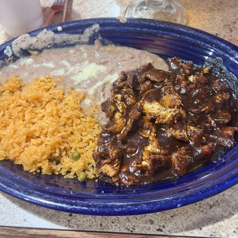 El Cazador - Good question. It was supposed to be a Mole Chicken. It was some over cooked chicken ( I think) with some warmed up Canned Mole sauce. - Mexican Near Me - Tifton, Georgia El Cazador - Good question. It was supposed to be a Mole Chicken. It was some over cooked chicken ( I think) with some warmed up Canned Mole sauce. - Mexican Near Me - Tifton, Georgia