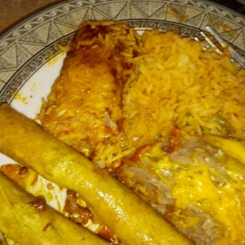 Roberto's Taco Shop - Tamal with red sauce. Dry rice and chicken flautas. No flavor. My girl got a Chicken Chimichanga it was ok but also dry. - Mexican Near Me - Reno, Nevada Roberto's Taco Shop - Tamal with red sauce. Dry rice and chicken flautas. No flavor. My girl got a Chicken Chimichanga it was ok but also dry. - Mexican Near Me - Reno, Nevada