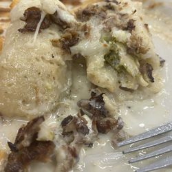Los Patios - This is what they now call a pork tamale filled with chicken and topped with pork !