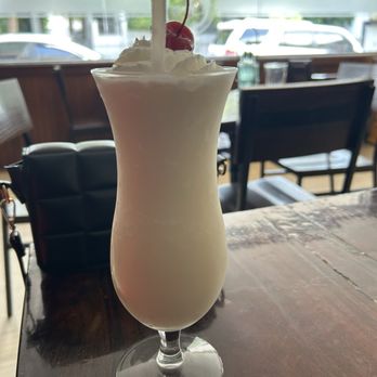 Los Pinos Café - Piña colada with rum - Bars Near Me - San Juan, Puerto Rico