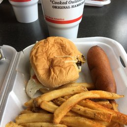 a hamburger and fries on a tray a hamburger and fries on a tray