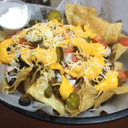 The Draft House - Loaded nachos, they use homemade chips and they were still hot!