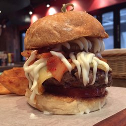 The Butchers Club - WuTang Burger: beef patty with kimchi, kewpie mayo, sriracha, and deep fried sweet potato.