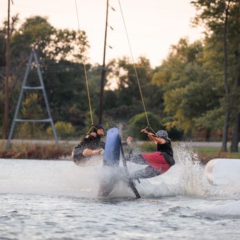West Rock Wake Park - Board "high 5" with local lappers Lucas and Jeremy. - Lakes Near Me - Rockford, Illinois West Rock Wake Park - Board "high 5" with local lappers Lucas and Jeremy. - Lakes Near Me - Rockford, Illinois