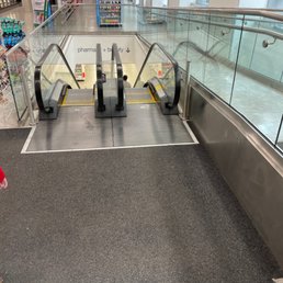 an escalator in a store an escalator in a store