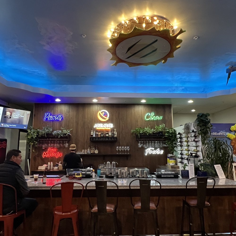 Arempa's  - Midvale -  man sitting at the bar - Venezuelan Near Me - Midvale, Utah