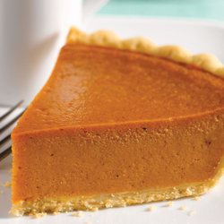 Village Inn - Our Pumpkin Pie Dessert with real pumpkin custard spiced with Saigon cinnamon, ginger and nutmeg, baked inside our flaky pastry crust!