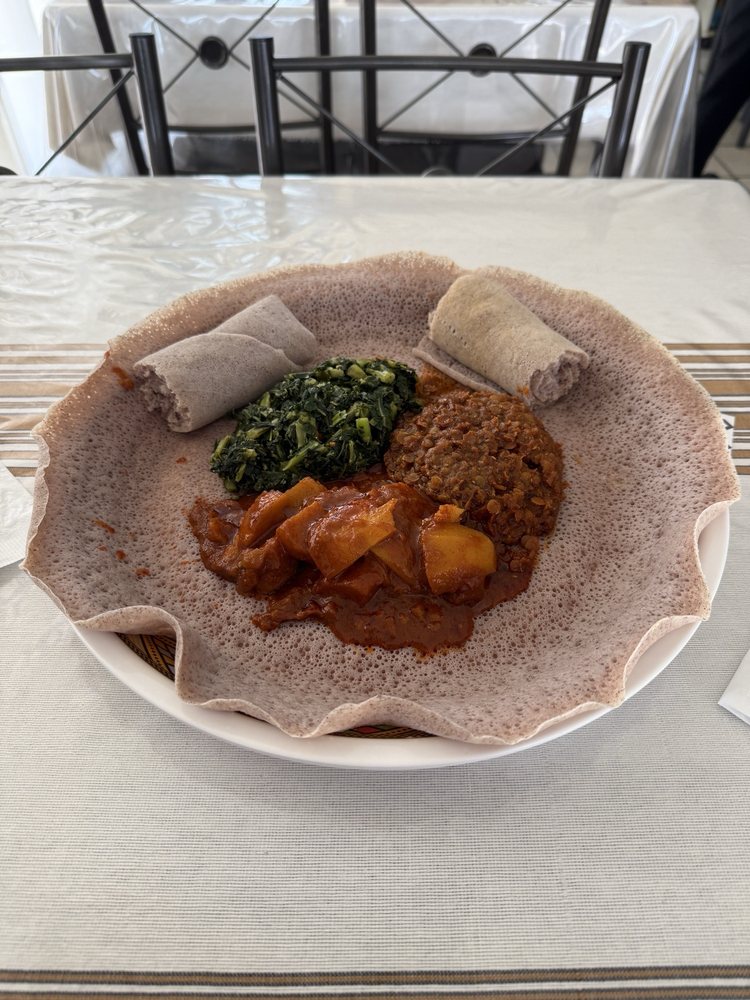 Marhaba Eritrean and Ethiopian Cuisine Logo