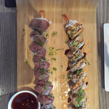 CO - Wagyu (seared beef) roll on the left and the ebi tempura (crunchy shrimp) roll. The wagyu can be cooked to your taste. - Vietnamese Near Me - Charlotte, North Carolina CO - Wagyu (seared beef) roll on the left and the ebi tempura (crunchy shrimp) roll. The wagyu can be cooked to your taste. - Vietnamese Near Me - Charlotte, North Carolina
