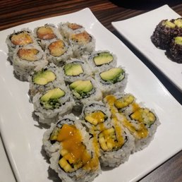 From top to bottom: Spicy Salmon Avocado Cucumber Mango Cucumber Roll Right: Brown Rice Avocado Cucumber Roll From top to bottom: Spicy Salmon Avocado Cucumber Mango Cucumber Roll Right: Brown Rice Avocado Cucumber Roll