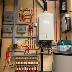 Wiehler Mechanical - A thoughtfully designed mechanical room with a Trane modulating furnace with zoned communicating system and variable speed AC.