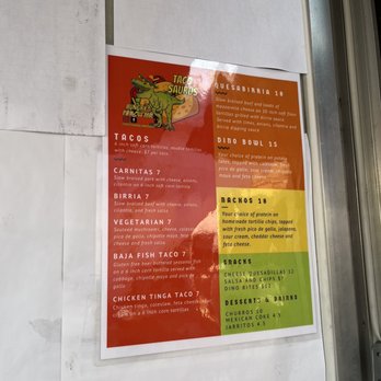 Taco Saurus - a menu on a wall - Food Trucks Near Me