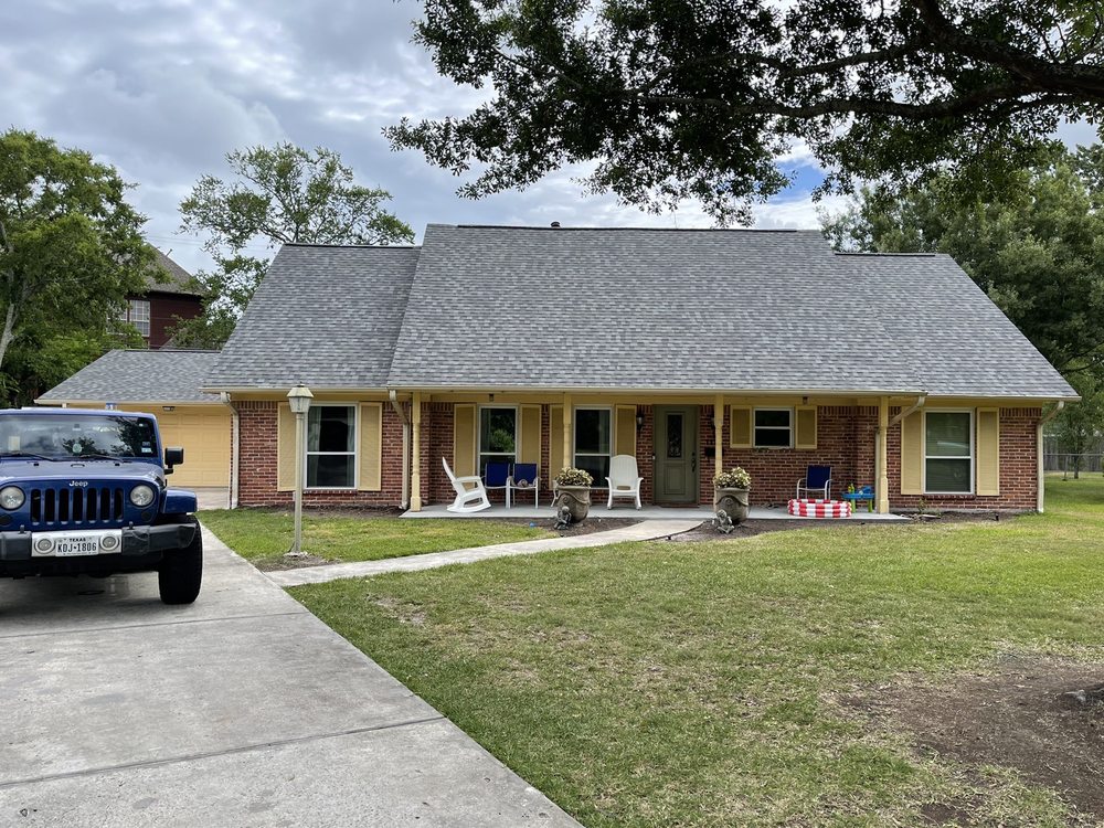 Slide of Dacoma Roofing