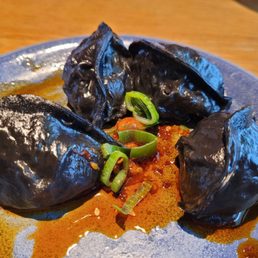 Squid ink dumplings were good Squid ink dumplings were good