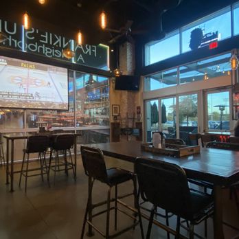 Frankie’s Uptown - Inside with large projection TV - American Near Me - Las Vegas, Nevada Frankie’s Uptown - Inside with large projection TV - American Near Me - Las Vegas, Nevada