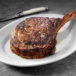 Ruth's Chris Steak House - TOMAHAWK RIBEYE - 40 oz USDA Prime bone-in ribeye, well marbled for peak flavor.