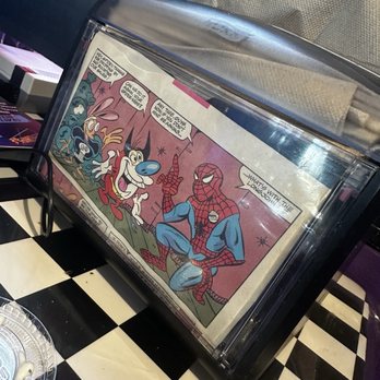 Flashback Pizza and Milkshakes - Fun comics on napkin dispenser - Pizza Near Me - Rogers, Arkansas