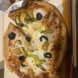 Pizza Hut - Personal pan with wings. A SINGLE piece of sausage on each slice. You can't tell from this photo but I ask for onions as well.
