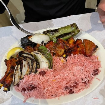 Raffi's Place - Rack of lamb with cherry rice - Middle Eastern Near Me - Glendale, California Raffi's Place - Rack of lamb with cherry rice - Middle Eastern Near Me - Glendale, California
