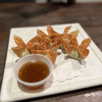 Sweetee Thai Cafe - a plate of wontons with dipping sauce - Thai Near Me - Artesia, California Sweetee Thai Cafe - a plate of wontons with dipping sauce - Thai Near Me - Artesia, California