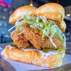 Dog Haus - BAD MUTHA CLUCKA - two crispy fried chicken tenders, miso ranch, dill pickle slices, lettuce